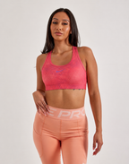 Top Nike Dri-Fit sportbra swoosh lila diseños 'Damasco'