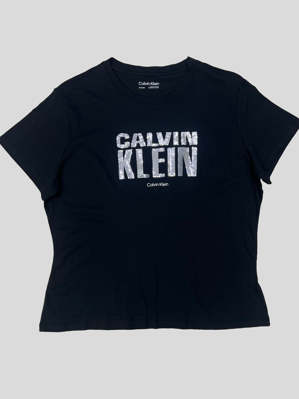 Polera Calvin Klein estampado lentejuelas ‘Negra’