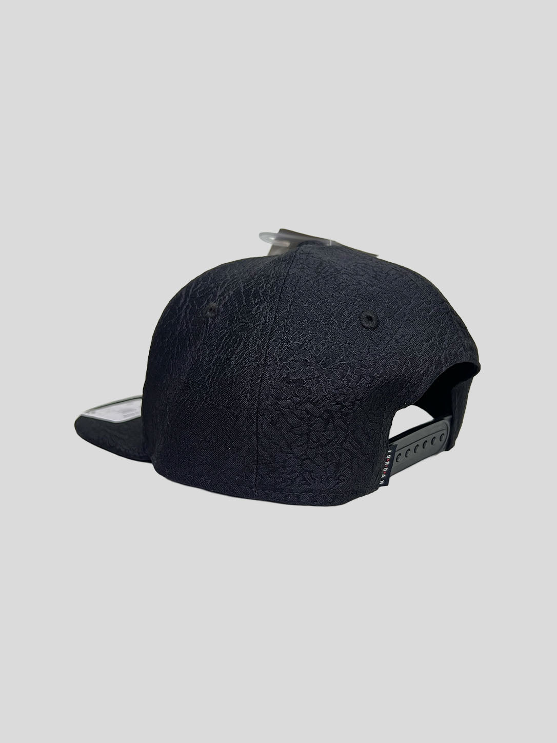 Gorra Jordan Jumpman Gold Snapback ‘Negra elephanprint’ Infantil