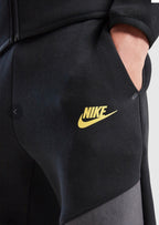 Pantalon buzo Nike Tech Fleece Kids (Gris/Grafito/ Swoosh amarillo)