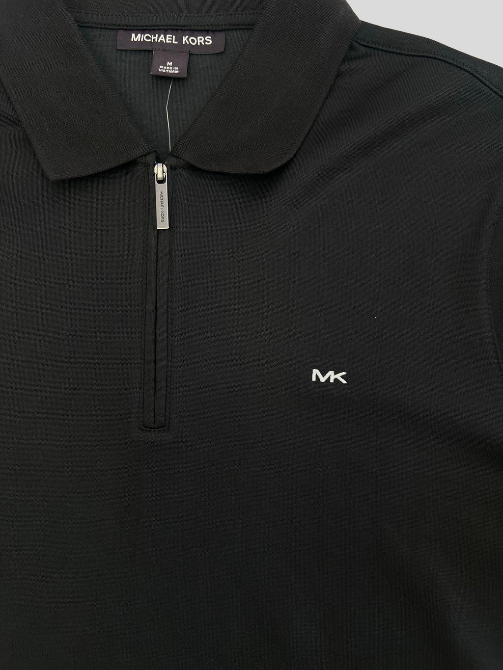 Polera Polo Michael Kors logo MK Sport c/cierre  ‘Negra’