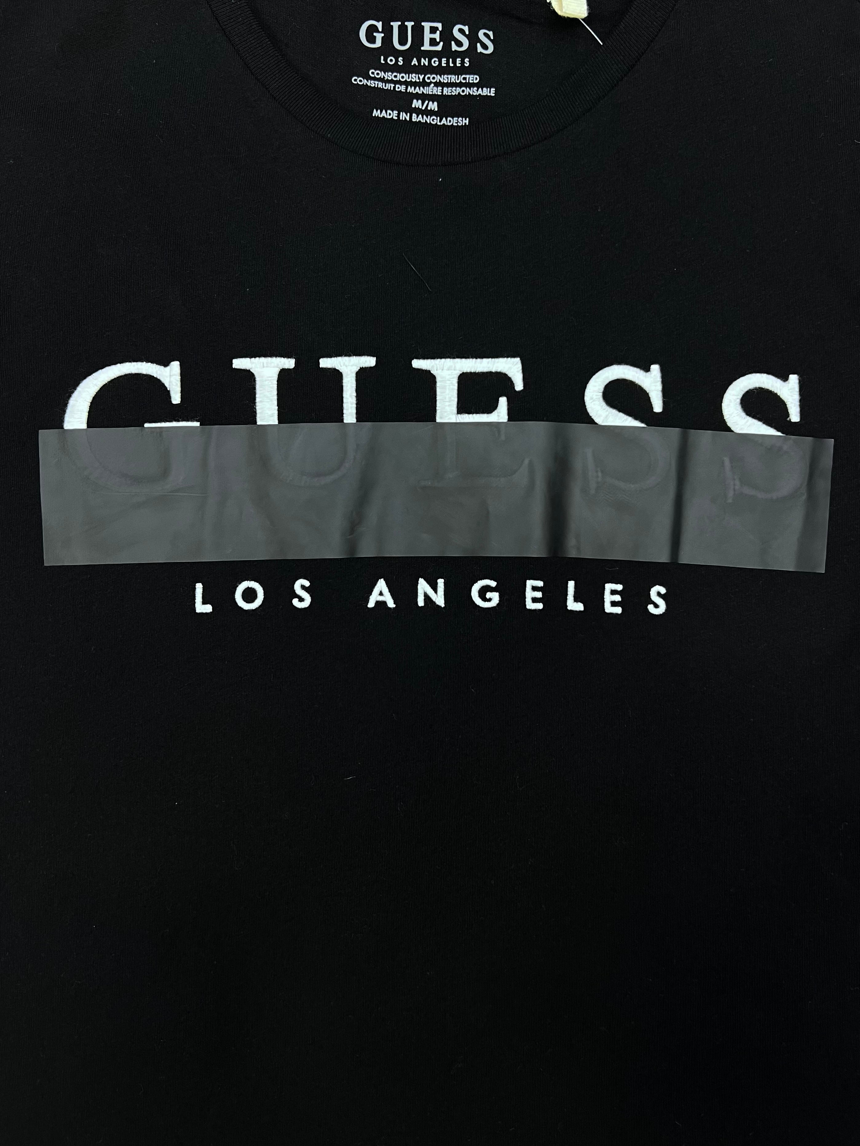 Polera Guess logo bordado  Franja Negra  ‘Negra’