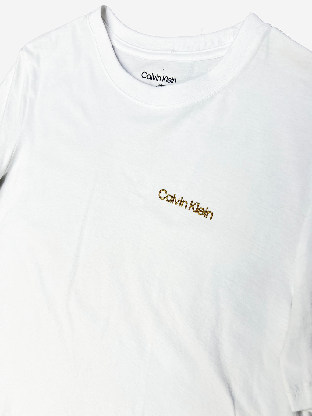 Polera Calvin Klein logo glitter dorado ‘Blanca’