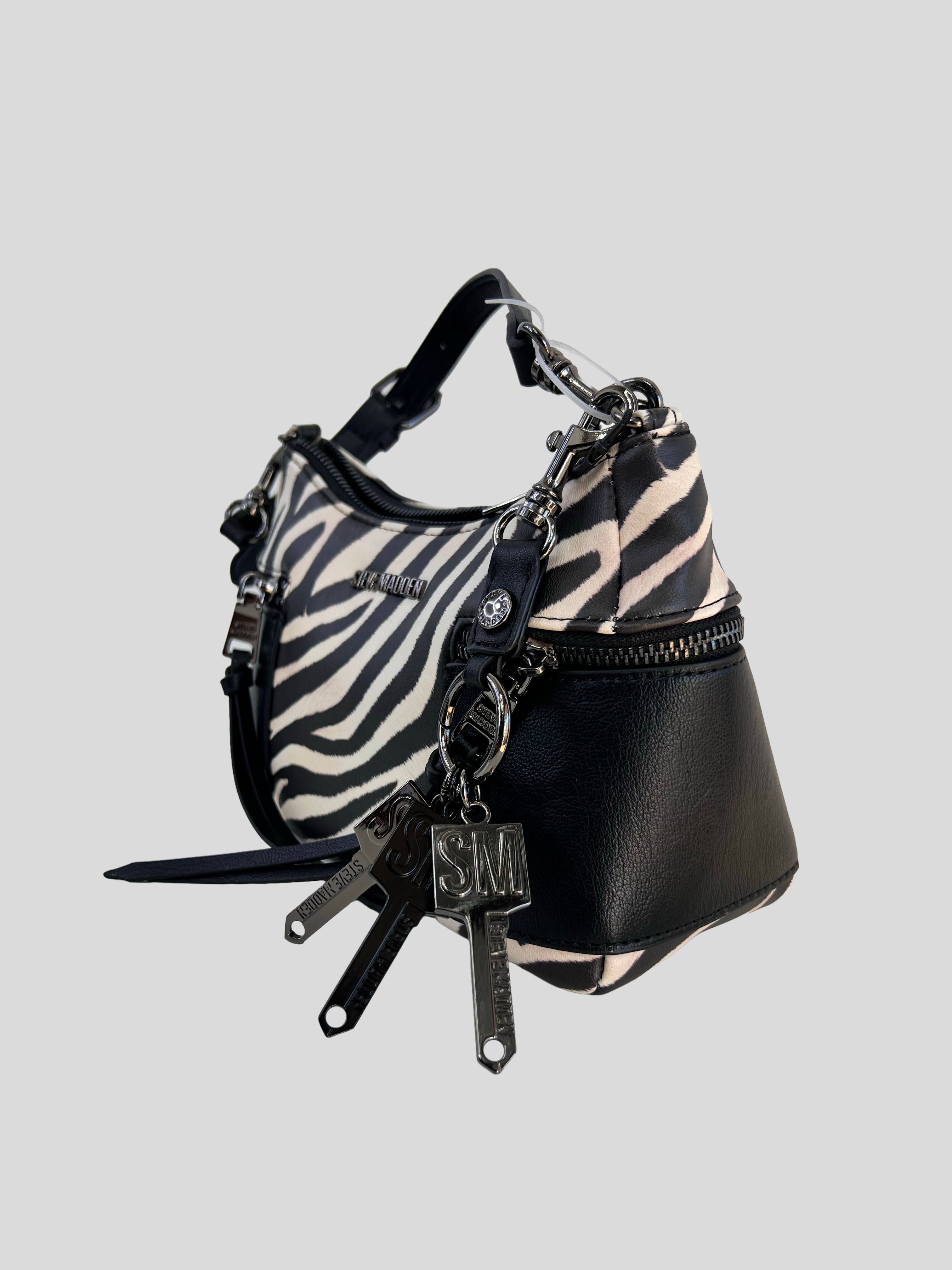 Cartera shoulder Steve Madden logo front  ‘Animal print Cebra ’