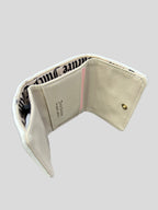 Porta documentos Juicy Couture Logo heart dorado ‘Beige’