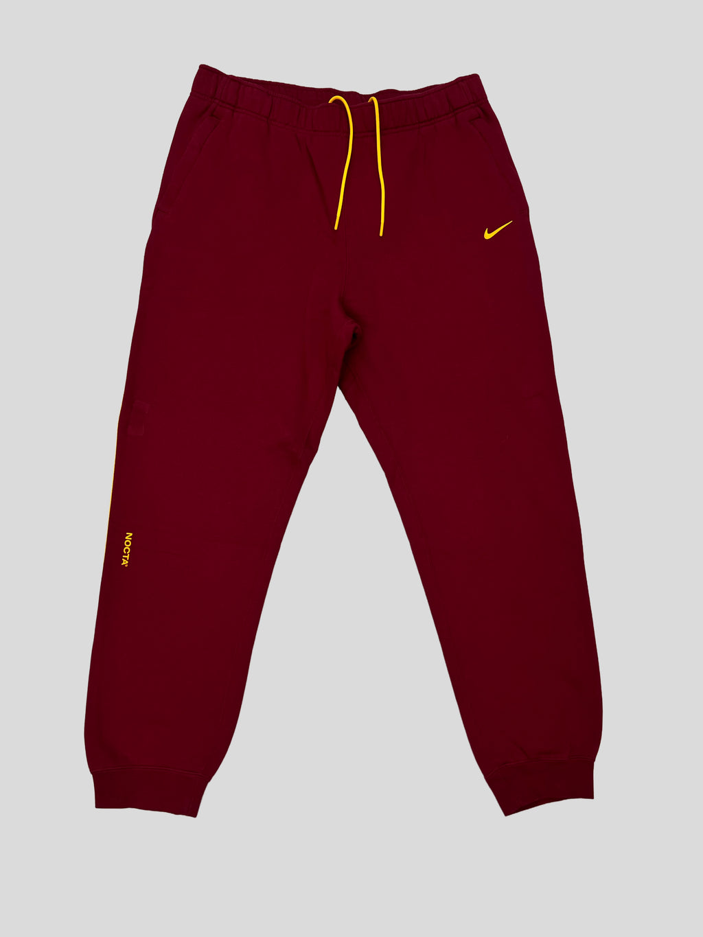 Pantalón Buzo Nike Nocta ´borgoña´