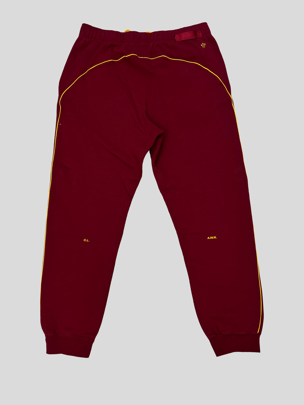 Pantalón Buzo Nike Nocta ´borgoña´