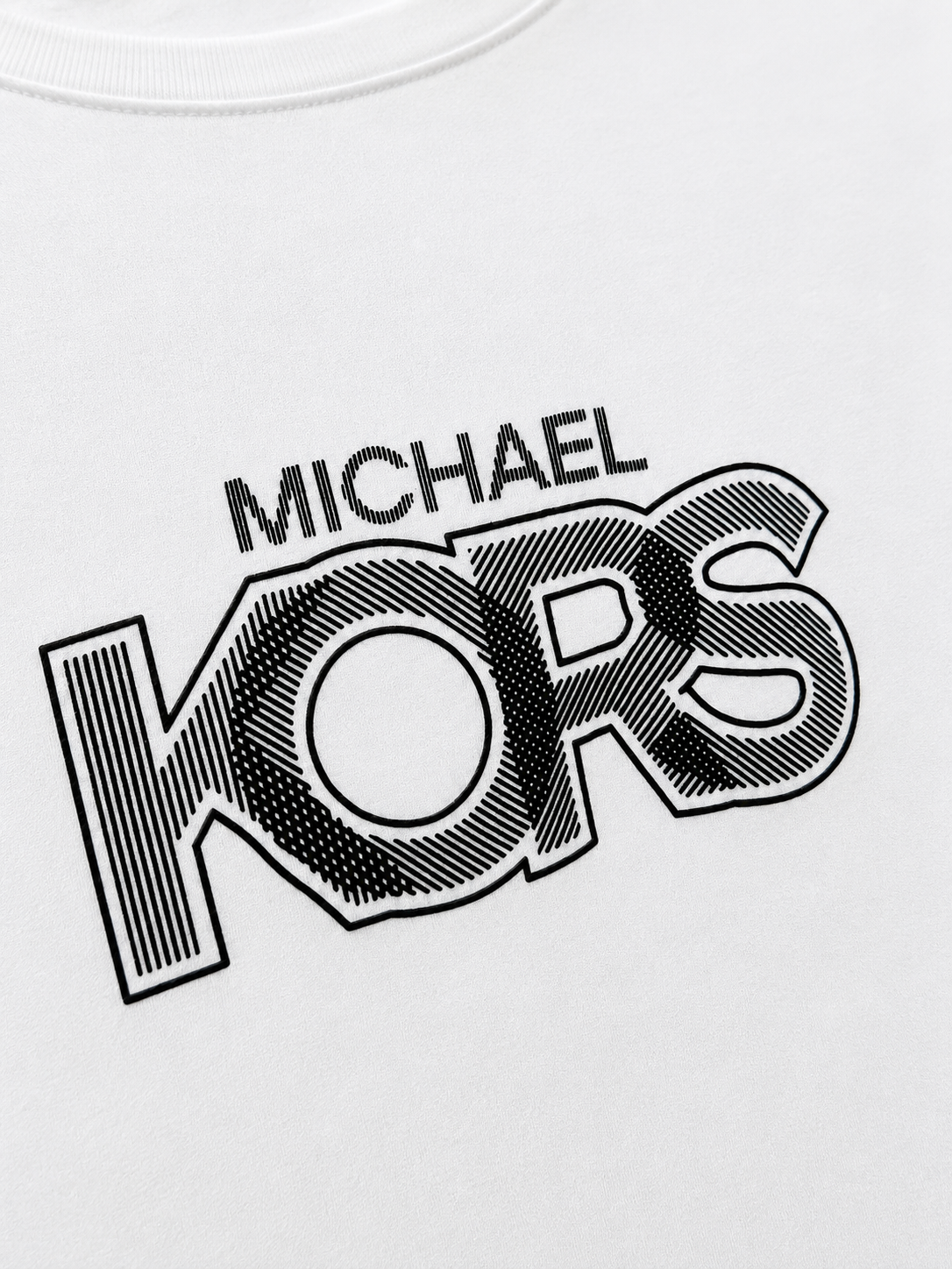 Polera Michael Kors logo relieve  ‘Blanca’