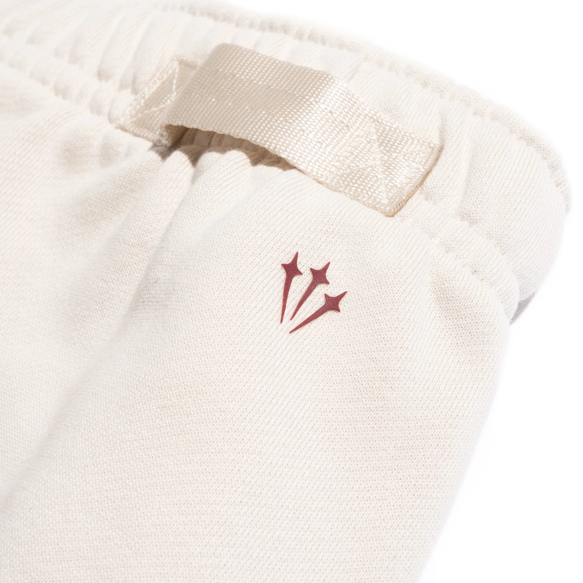 Pantalon Buzo Nike Nocta 'Blanco hueso'