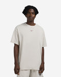 Polera Nocta Nike ‘Marfil’