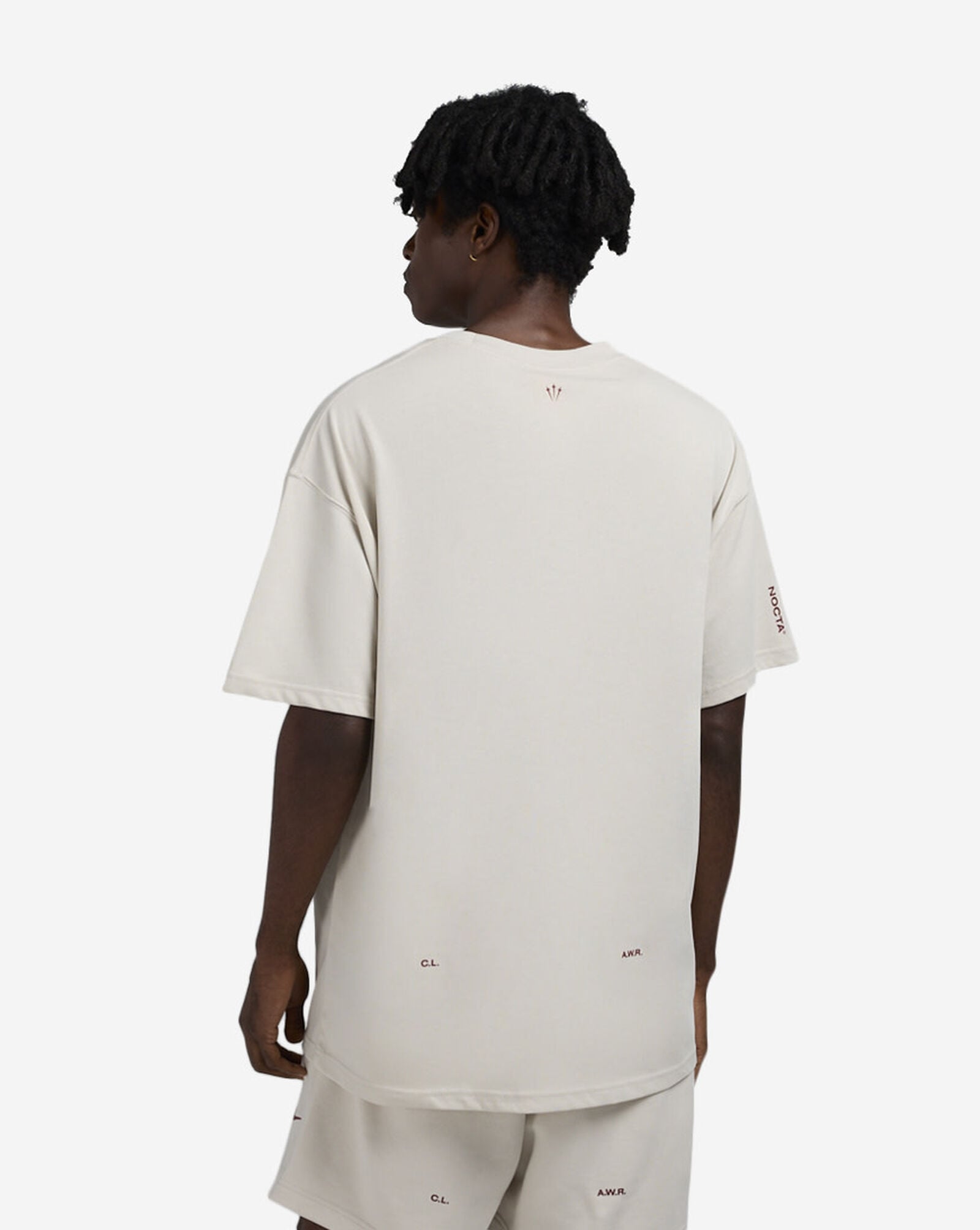 Polera Nocta Nike ‘Marfil’