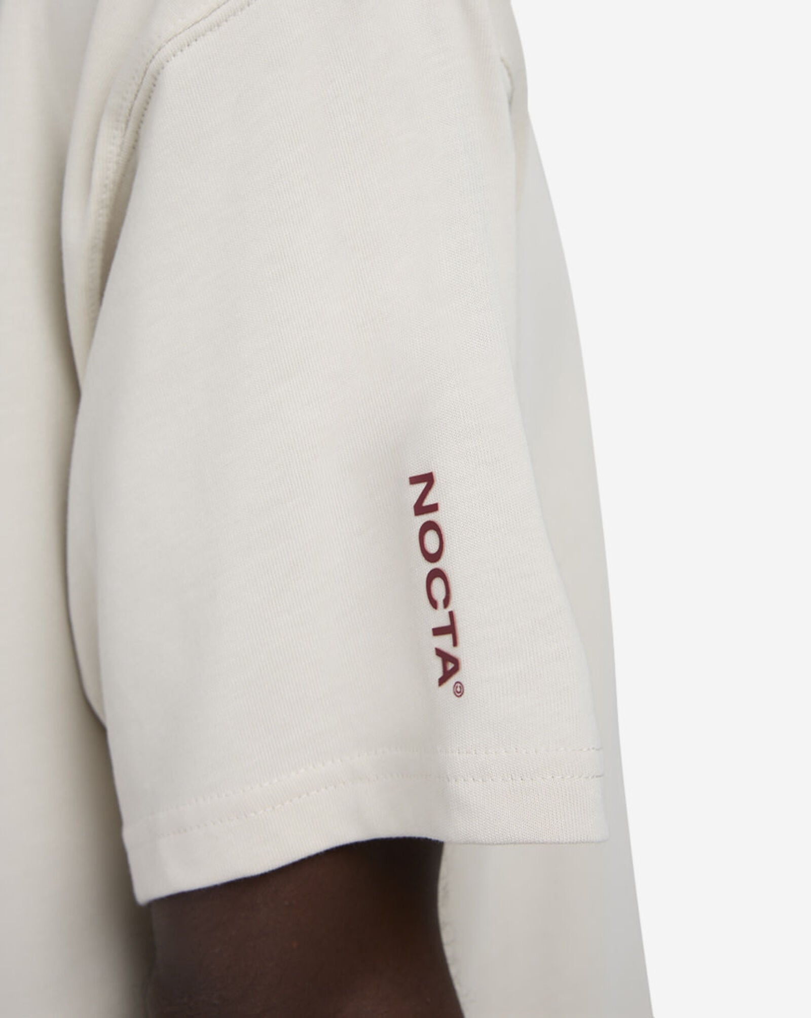Polera Nocta Nike ‘Marfil’